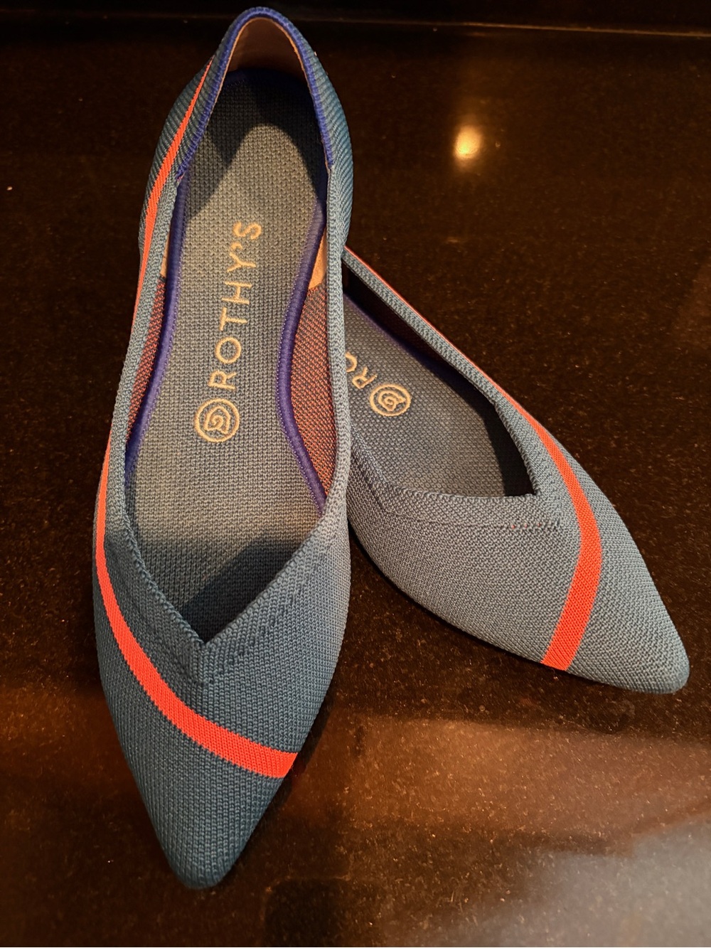 Rothy's Pointed Knit Flats in Blue with Vibrant Orange Stripe